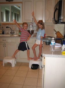 Josh, Sophie, and Midnight have fun making a cake for Dad, June 2008.